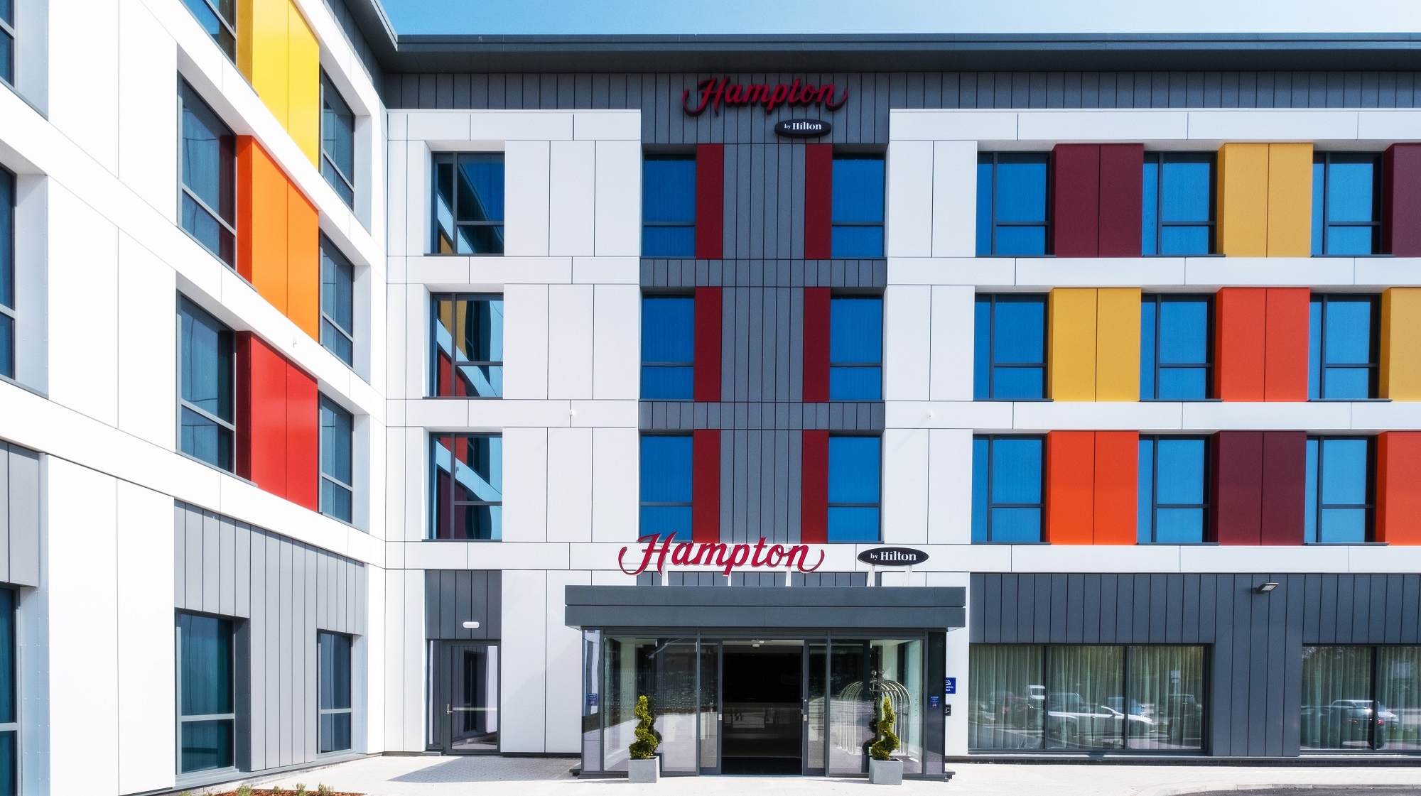 Logo of Hampton by Hilton Aberdeen Westhill